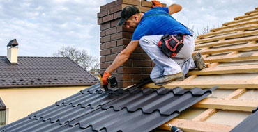 roof repair Huntington Park